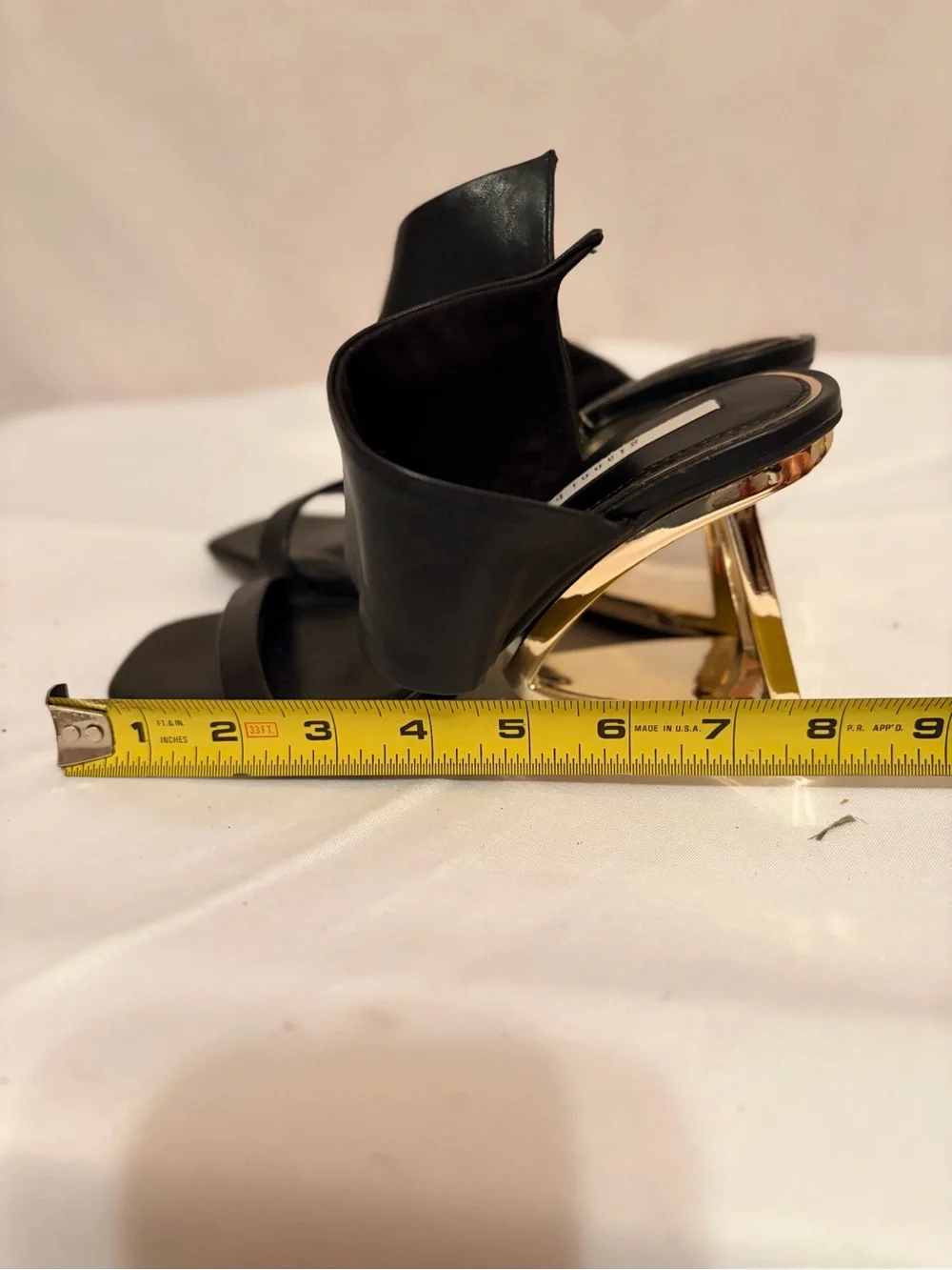 Gianni Bini Zeema unique gold architectural heels with black leather upper